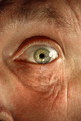 Image showing Close-up view on the eye of senior man.