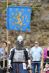 Image showing Medieval knight in full battle armour prepares to fight