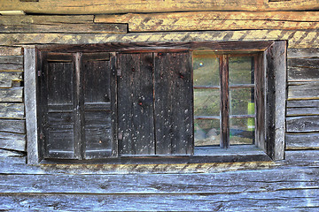 Image showing window on old log house