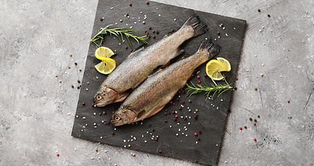 Image showing Fish with lemon on board