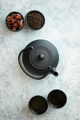 Image showing Traditional eastern metal teapot and iron cups