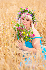 Image showing Woman at wheat meadow