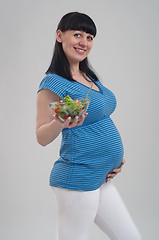 Image showing Pregnant woman on gray