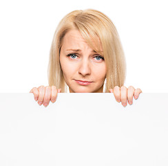 Image showing Woman with blank signboard