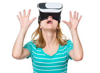 Image showing Woman looking in VR glasses