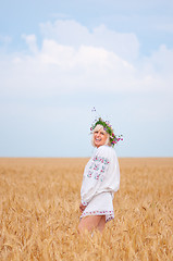 Image showing Woman at wheat meadow