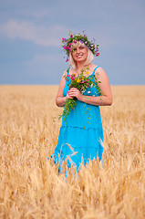 Image showing Woman at wheat meadow