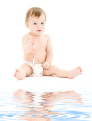 Image showing baby boy in diaper with toothbrush