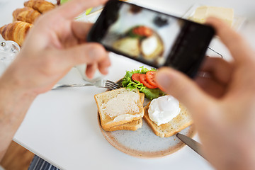 Image showing hands with smartphones photographing food