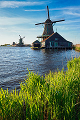 Image showing Windmills at Zaanse Schans in Holland on sunset. Zaandam, Nether