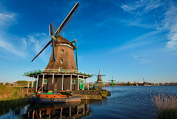 Image showing Windmills at Zaanse Schans in Holland on sunset. Zaandam, Nether