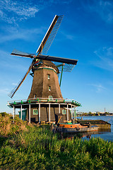 Image showing Windmills at Zaanse Schans in Holland on sunset. Zaandam, Nether