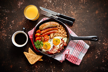 Image showing Delicious english breakfast in iron cooking pan