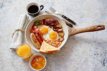 Image showing Traditional Full English Breakfast on frying pan.