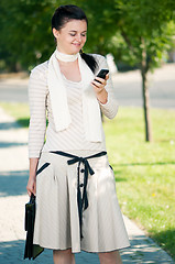 Image showing Business young woman in park