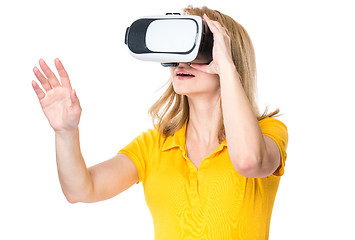 Image showing Woman looking in VR glasses