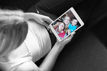 Image showing woman using tablet in beautiful apartment