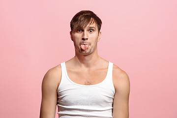 Image showing Handsome man in stress isolated on pink