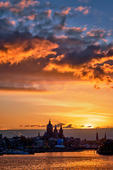 Image showing Amsterdam cityscape skyline with  Church of Saint Nicholas on su