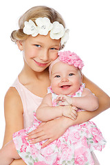 Image showing happy beautiful girl with baby baby sister