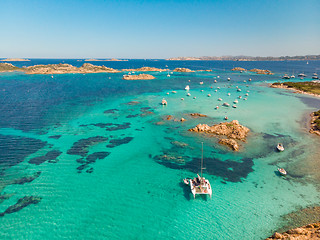 Image showing Drone aerial view of catamaran sailing boat in Maddalena Archipelago, Sardinia, Italy.