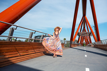 Image showing Woman walking across Yandhai Nepean Crossing