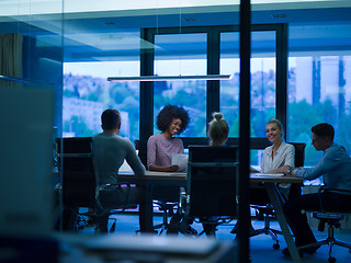 Image showing Multiethnic Business Team At A Meeting at modern office building