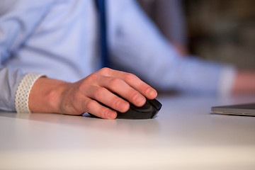 Image showing Hand using computer mouse closeup