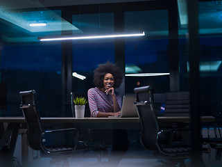 Image showing black businesswoman using a laptop in startup office