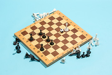 Image showing soccer ball of chess pieces on the board