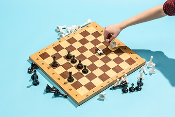 Image showing soccer ball of chess pieces on the board