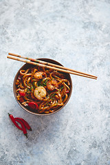 Image showing Traditional asian udon stir-fry noodles with shrimp
