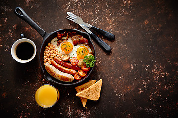 Image showing Delicious english breakfast in iron cooking pan