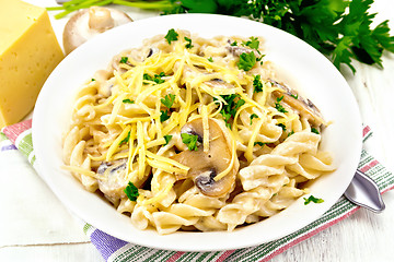 Image showing Fusilli with mushrooms and cream on towel