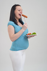 Image showing Pregnant woman on gray