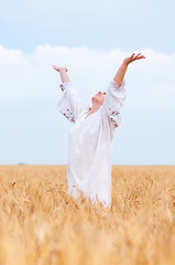 Image showing Woman at wheat meadow