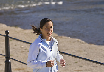 Image showing Jogging on the riverside