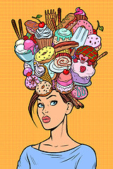 Image showing Hungry woman thoughts concept. Sweets baking birthday