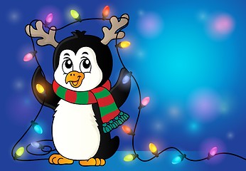 Image showing Penguin with Christmas lights image 2