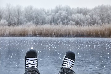 Image showing Skating on a lake