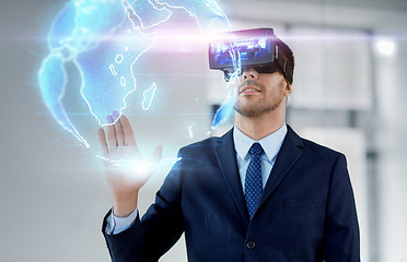 Image showing businessman with virtual reality headset at office