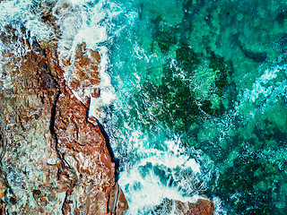 Image showing Aerial topdown views of the pristine ocean and rocks Durras