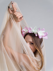 Image showing young bride in a wedding dress with a veil