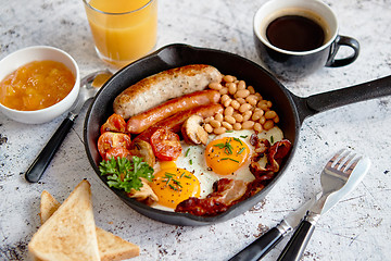 Image showing Delicious english breakfast in iron cooking pan