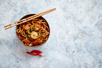 Image showing Traditional asian udon stir-fry noodles with shrimp