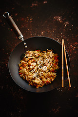 Image showing Delicious fried rice with chicken in wok