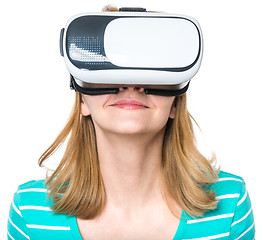 Image showing Woman looking in VR glasses