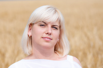 Image showing Woman at wheat meadow