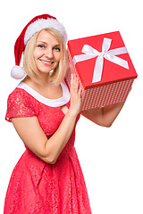 Image showing Woman in santa hat with box