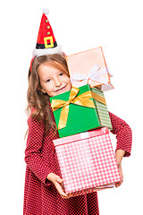 Image showing Girl in santa hat with gift box